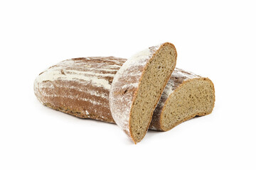 Freshly baked whole grain bread loaf and slices showing soft texture and rustic crust