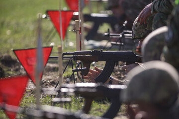 Romanian reservists take part at a drill where they train to shoot weapons