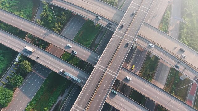 Aerial view city transport junction road morning light with vehicle movement transport industry