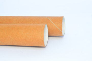cardboard mailing tube packaging isolated on a white background. Perfect as a blank mockup for posters, documents, shipping, and architectural blueprints.