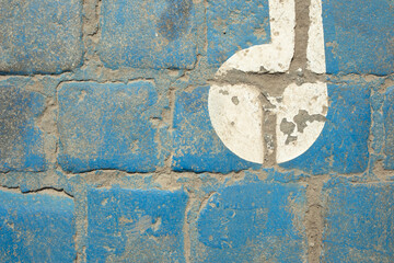 Old granite pavement painted in blue and white. Geometryczny wzór. Project space. Top view.