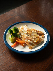 grilled sea bass fish with carrot and broccoli