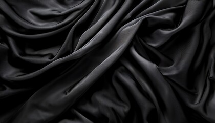 Obraz premium The Background Image Of The Fluttering Cloth Has Bold Black Colors And Patterns