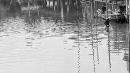 Monochromatic River Scene with Boat