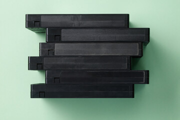 Stack of vintage VHS cassette tape. Retro VHS video tape cassette for nostalgic home video. Vintage media concept. 