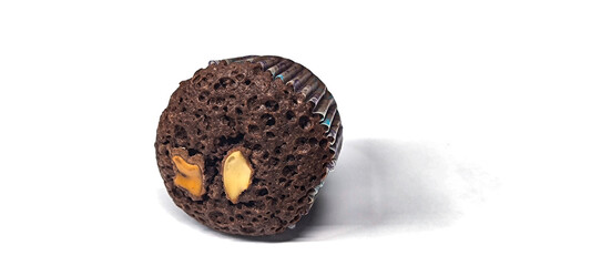 Chocolate cupcakes in paper cups on a white background