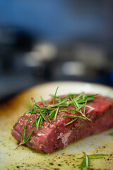 Raw Beef Steak with Fresh Rosemary – Front View