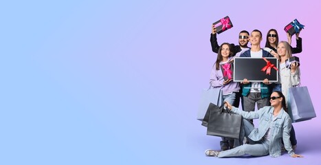 Group of young people with gifts on color background with space for text. Cyber Monday