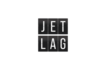 Jet Lag Text on Split Flap Display – Conceptual Travel Fatigue and Time Zone Change Symbol in Retro Airport Style