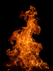 Intense flames dancing against a dark background, creating a captivating fiery spectacle.