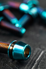 Titanium bicycle bots on a black textured background