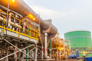 Demineralized water tank and multi effect desalination plant (MED) at industrial power plant. A thermal technology uses steam to produce distilate water from seawater	