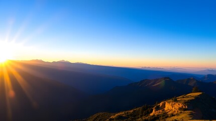Fototapeta premium Golden Sunrise Over Peaceful Mountain Ridges and Blue Sky