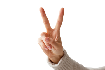Close-up of a hand making a "V" sign, isolated on a black background