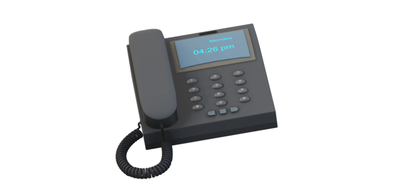 Gray office phone displays the time and day on its screen against a providing a clear view of communication technology at work
