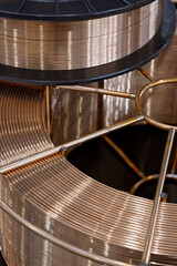 Spool with copper coated welding wire for semi-automatic welding machine