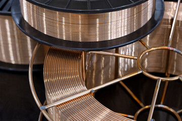 Spool with copper coated welding wire for semi-automatic welding machine