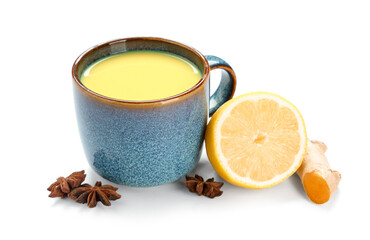 Cup of healthy turmeric drink and ingredients isolated on white background, closeup