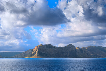 Sicilian coast near Palermo, Italy: view from the sea of ​​the Capo Gallo Nature Reserve.