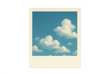 Instant film print showing blue sky and fluffy white clouds, capturing a nostalgic travel memory, transparent background