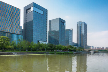 Stunning Urban Reflections: A Glimpse of Modern Architecture by the Water's Edge