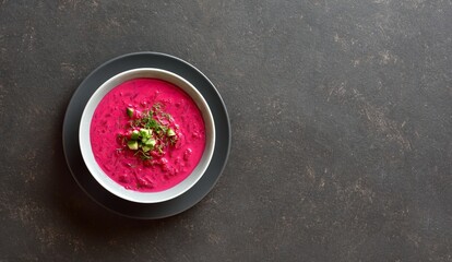 Beet cream soup with yogurt, cucumbers and dill
