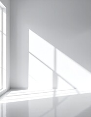 Empty, bright, minimalist interior, with shadows cast by a large window