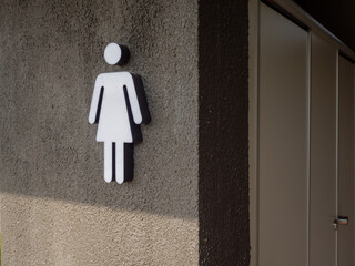 Closeup of Modern Women's Toilet Symbol in a Public Space