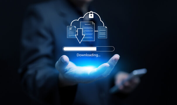 A businessman holding a holographic download icon. Cloud technology, data transfer, digital storage. Concept of online file sharing, cloud computing, or secure data download.