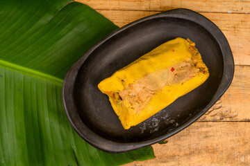Tamal Typical Colombian Food Wrapped in Banana Leaves