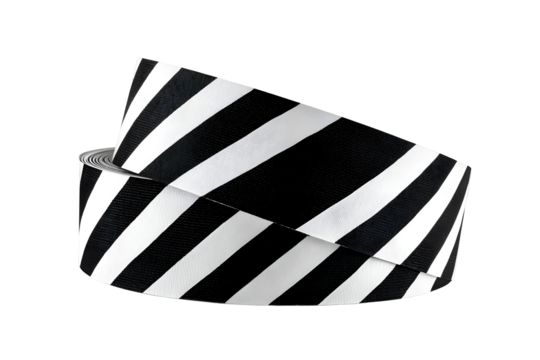 Safety caution tape with black and white diagonal stripes for warning signs