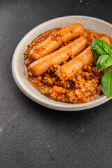 Sausage with lentils second course tasty snack fresh delicious gourmet food background on the table rustic top view copy space