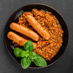 Sausage with lentils second course tasty snack fresh delicious gourmet food background on the table rustic top view copy space