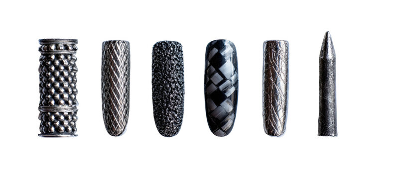 Five cylindrical objects, varying in texture and pattern, set against a black background.  Each displays a unique surface design, creating a visually interesting collection of shapes and textures