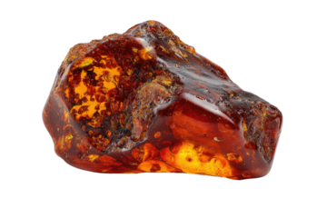 Close-up of a rough, amber-colored gemstone