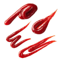 Naklejka premium Close-up of four drizzled ketchup blobs. Red, viscous sauce forms irregular shapes. Isolated on black background