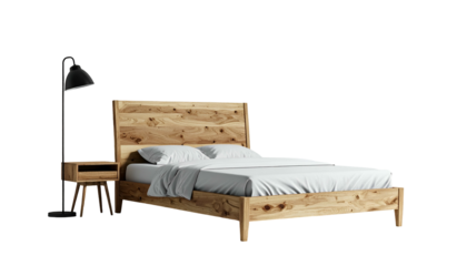 A bedroom setup featuring a wooden bed with white linens, bedside table, and a lamp