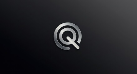 Metallic silver letter Q logo design on dark background.