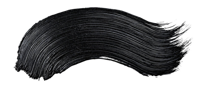 Black mascara swipe against a black background