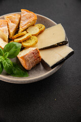 Cheese plate different kind of cheese appetizer tasty snack fresh delicious gourmet food background on the table rustic top view copy space