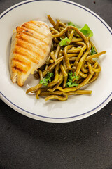 Chicken breast and green beans grilled chicken meat natural product tasty snack fresh delicious gourmet food background on the table rustic top view copy space keto and paleo diet