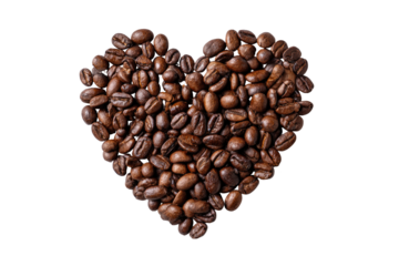 Heart-shaped arrangement of coffee beans against a black background
