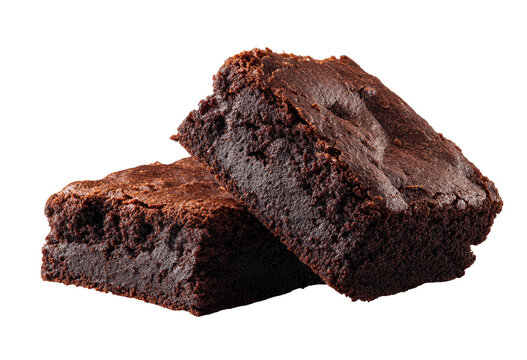 Two rich, dark brownies, sliced and overlapping