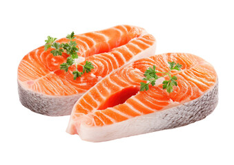 Two fresh salmon fillets, sliced, with parsley sprigs, isolated on white
