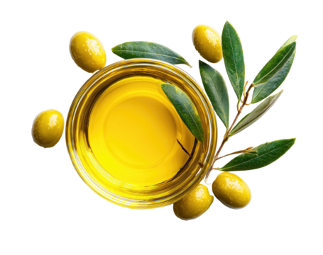 Top-down view of olive oil in a bowl, surrounded by olives and leaves