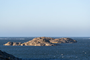 Last island of rocks before open sea on Sweden west coast into Skagerak and Atlantic ocean