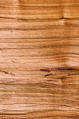 Warm, golden brown wood grain texture background. Abstract backdrop with strong horizontal lines, symbolizing nature, simplicity, and interior design.