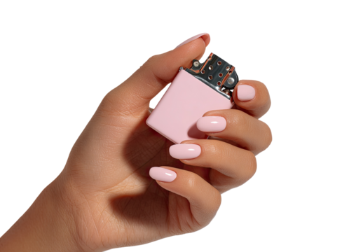 A hand holds a small, light pink lighter.  Nude nails