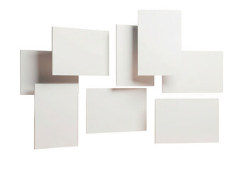 A collage of blank white paper rectangles arranged in a scattered pattern isolated on transparent background