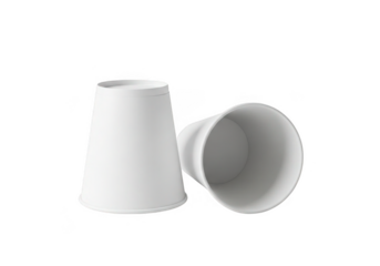 Two plain white paper cone cups one upright and one tilted on a transparent background isolated on transparent background